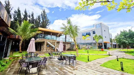 Xu Wen sha hai wan min su Отели рядом с достопримечательностью «Denglou Cape»