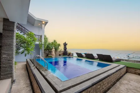 Barton Beach Inn Отели рядом с достопримечательностью «Giri Putri Cave»