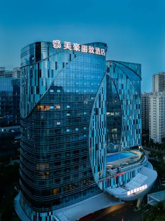 Meihao Lizhi Hotel (Haikou West Coast International Convention & Exhibition Center Branch) Отели рядом с достопримечательностью «Jinshawan Coastal Park»