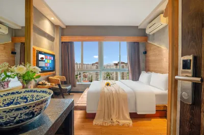 WEIXIMAN HOLIDAY  HOTEL Hôtels à : O-Park