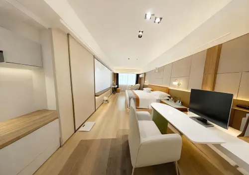Qianjiang Gaoya Meiju Hotel