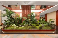 Aisige Elegant Garden Hotel - Fitnessstudio