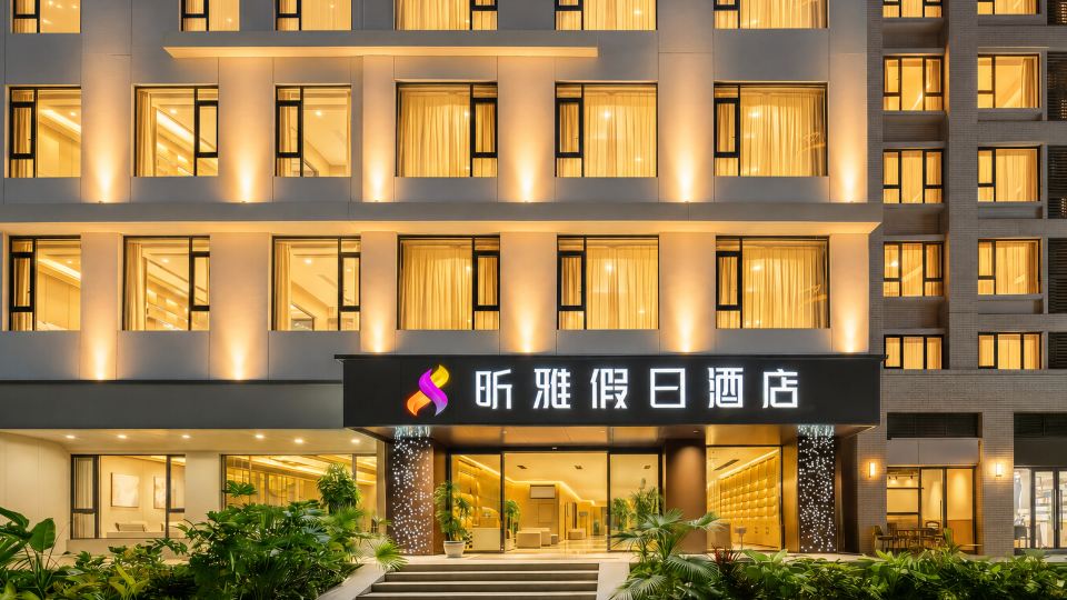 Xishuangbanna Xinya Holiday Hotel (JingHong Gao Zhuang Xi Shuang Jing Xingguang Night Market Branch)