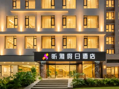 Xishuangbanna Xinya Holiday Hotel (JingHong Gao Zhuang Xi Shuang Jing Xingguang Night Market Branch)