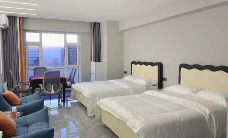 Daqing Shengji Homestay (Wanda Branch) Отели рядом с достопримечательностью «Daqing Normal University»