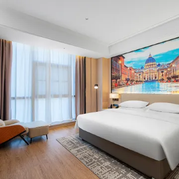 Vienna International Hotel (Qujing Luliang Tongle Plaza)