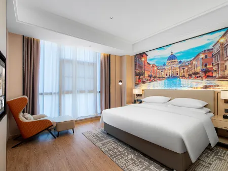 Vienna International Hotel (Qujing Luliang Tongle Plaza) Отели в г. Лулян