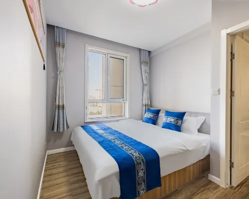 Qingyun Boutique Vacation Apartment (Weihai High-Speed Railway Station Hanlefang) Zimmer Photos