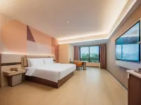 Orange Chengdu Wenjiang University City Hotel Отели рядом с достопримечательностью «Луцзянь Бич»