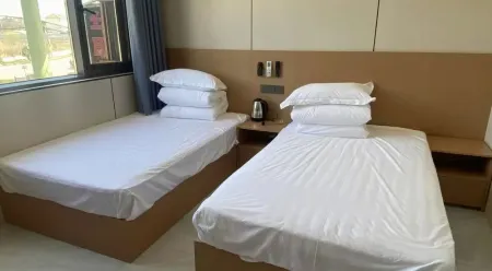 Xincheng Hotel Отели рядом с достопримечательностью «Yuncao Ancient Town»