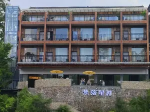 Mengluo Xinghe Hotel