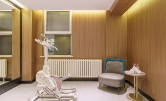 Magnolia Business Hotel ( Dalian Jinzhou Hengda Garden)