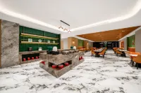 Grand Rezen Hotel Zhaosu  (Tianma International Tourism Cultural Plaza Jiefang Street) - فطور