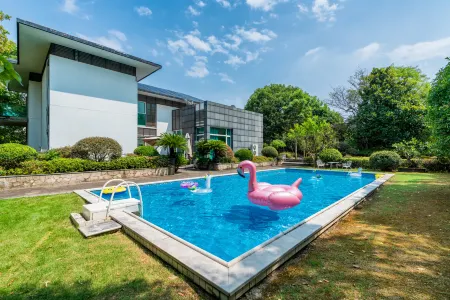 Shanghai Meishu Time Swimming Pool Party Single-family Villa Отели рядом с достопримечательностью «Shanghai International Studies University (Wenxiang Road)»