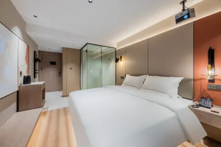 Jiqing Hotel (Lishuizhongshan Street) Отели в г. Лишуй