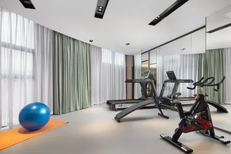 Qiyue Hotel Shenzhen (Longgang Nanlian Subway Station) Отели рядом с достопримечательностью «Shenzhen Technician College»