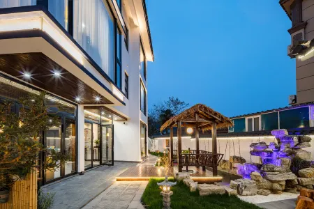 Floral Hotel·Zhujiajian Muting Hotel(Nansha Branch) Отели рядом с достопримечательностью «Tawan Golden Sand Beach»