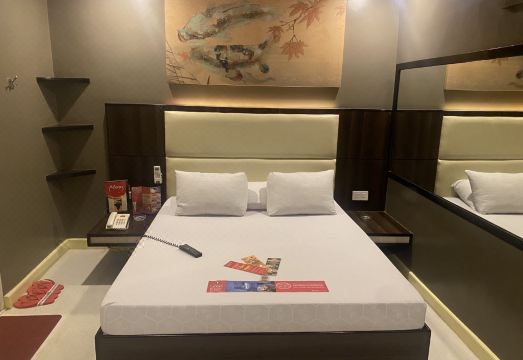 호텔 소고 – 케손 애비뉴 객실