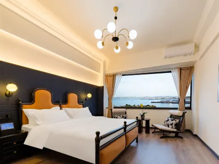 Floral Hotel·Langyue Seaview hotel (Weihai Xingfumen Weigao Plaza) Отели рядом с достопримечательностью «Harbin Institute of Technology»