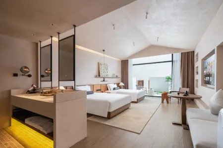 Summer Solstice Peninsula · Xingshu (Wanning Shenzhou Station Store) Отели рядом с достопримечательностью «Xinglong Tropical Garden»