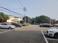 Junhao Shangjing Hotel (Changxing South Station Mingzhu Second Road) - parking