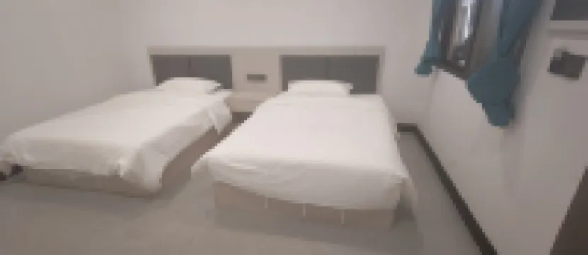 Dong 'Du Da  Jiu  Dian 萬象站附近的飯店