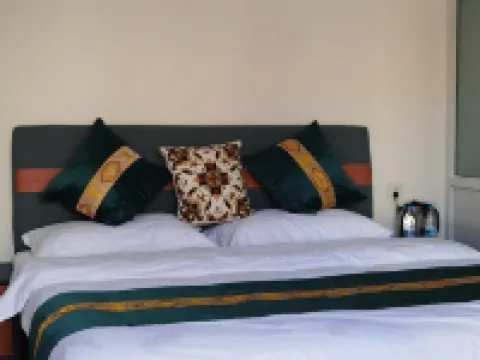 格桑花民宿 粛南ユグル族自治県のホテル