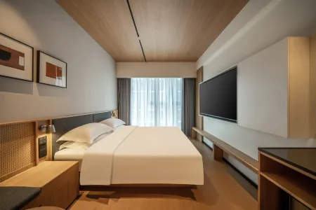 SFEEL Design Hotel (Chengdu Wenjiang Guanghua Park Subway Station) Отели рядом с достопримечательностью «Chengdu Normal University»