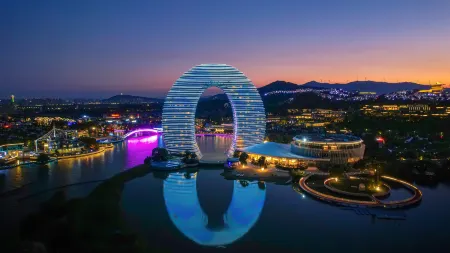 TAI LAKE DREAMLOHAS VILLA RESORT Отели рядом с достопримечательностью «Zhangtianyang Wetland»