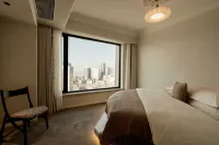 Haigang You·Man Scenic Apartment (Dalian Renmin Road Zhongshan Square Subway Station) Отели в г. 