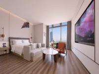 Elong Hotel (Qingdao Oriental Movie Metropolis فنادق في تشينغ داو