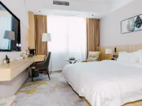 如家UP華驛精選酒店（鹽城東台高鐵站八佰伴店） Hotels in Dongtai