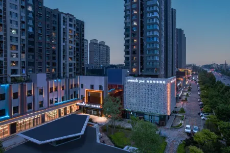 Wanda Yuehua Linyi Отели в г. Линьфэнь