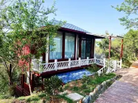 Liangdang Guolao Ecological Culture Tourism Kangyang Industrial Park Lushan Juzhusu Hotels near Hongqing Railway Station