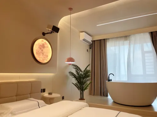 Daqing Intercontinental Smart Apartment (Ranghu Road Wanda Branch) - โฮมสเตย์