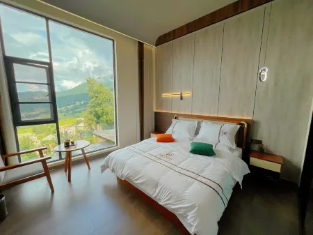 Yuanyang Tianchi Tianyuan Chinese Inn Отели рядом с достопримечательностью «Laohuzui Terraced Field Scenic Area»