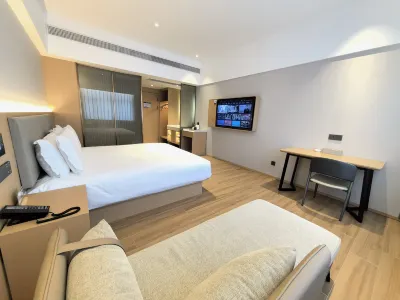 Huixuan Mizhu Hotel Hotels near Junlian Population Cultural Square