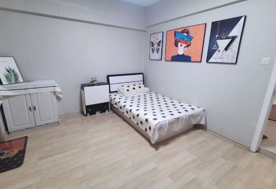 Benxi New Mart Jane Airi Rental Apartment의 침실 이미지