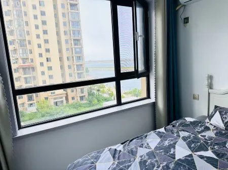 Longkou Qihai Xiaozhu B&B (Coast Huafu Branch) Отели рядом с достопримечательностью «Dao'enhu Park»