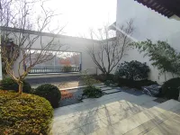 Zangma Mountain, Yunming Villa Отели рядом с достопримечательностью «Адо-Цвета»