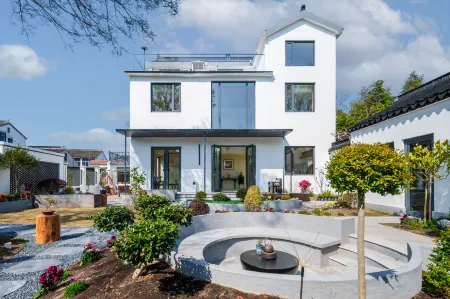 Sister Zhou's Guest House Отели рядом с достопримечательностью «Ботанический сад Цзяньнан»