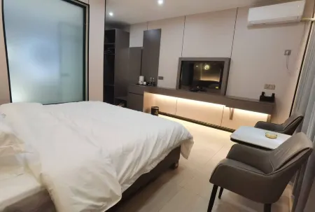 Aishang Hotel (Zengdian Village) Отели рядом с достопримечательностью «Dongzhai Crested Ibis Home Bird Photography Base»