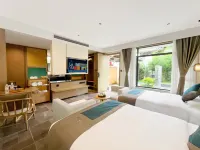 Songfengju Courtyard Hotel (Xingyi Wanfenglin Airport & High-speed Railway Station Branch) Hotel dekat Jushan Square