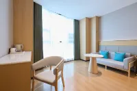 Ruge Sanqiu Rose Garden Hotel (Wanda Plaza)