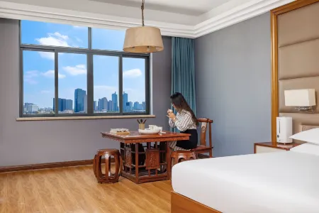 Meigaomei Hotel (Yongkang Automobile East Station International Convention and Exhibition Center) Отели рядом с достопримечательностью «Zhejiang Sci-Tech University Yongkang Teaching Station»