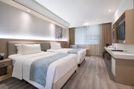 xindu Liuhua Hotel Отели рядом с достопримечательностью «Baoguang Monastery»