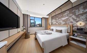 Aishang Baide Hotel (Yiwu International Trade City Xinguanghui Branch)