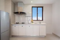 Wanning Shouchuang Yijing Boutique Suite Apartment