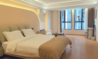 Mingren Cinema Boutique Hotel (Huangshigang Wanda Plaza)