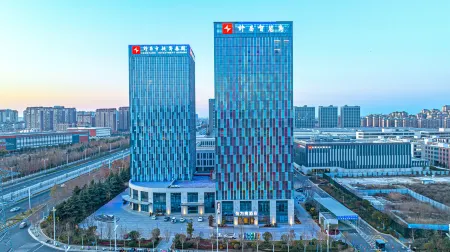 Hewei Gui Hotel (Xuchang East Station Branch) Отели в г. Сюйчан